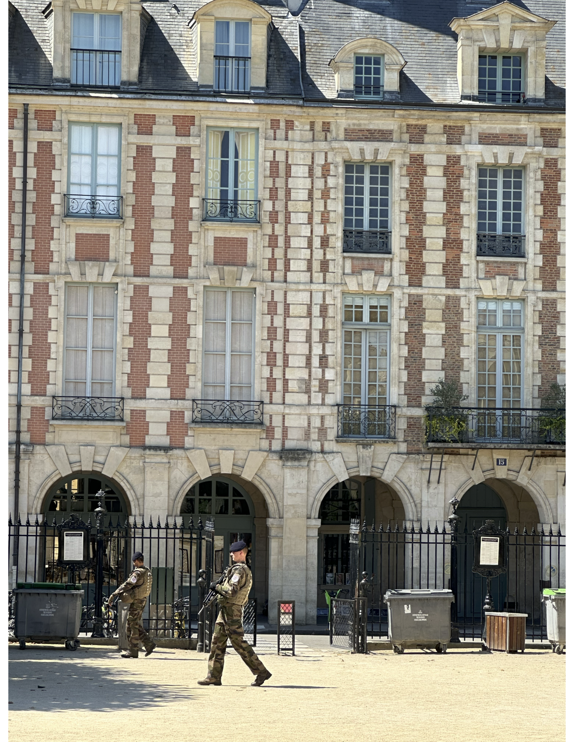 French soldiers patrolling Place des Vosges, Paris